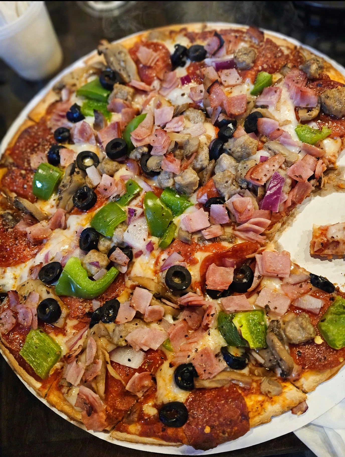Fresh pizza at Wings Sports Bar